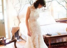 abito da sposa a sirena in pizzo con corpetto ricamato