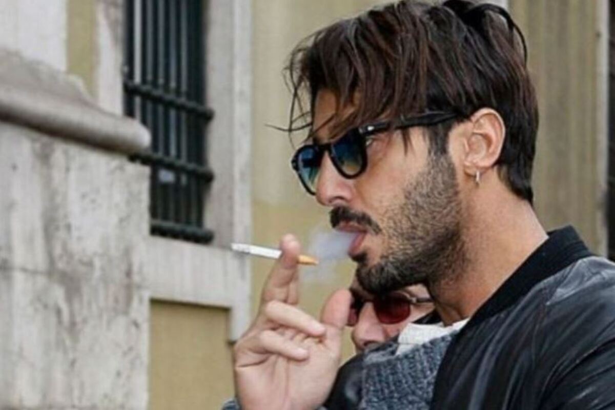 fabrizio corona si taglia il braccio